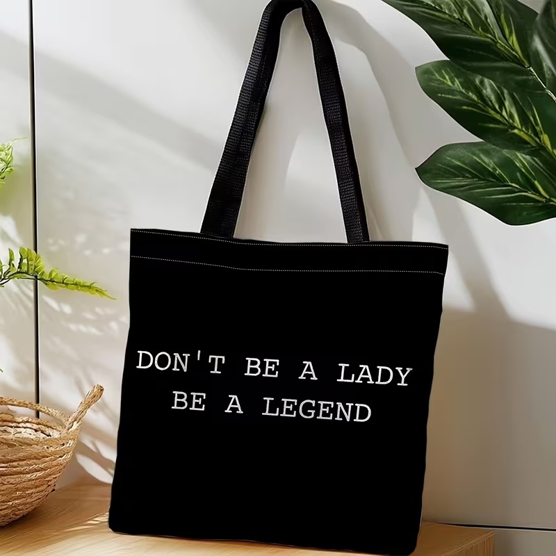 Чорна сумка-шопер з мотиваційним написом “Don’t Be A Lady Be A Legend”